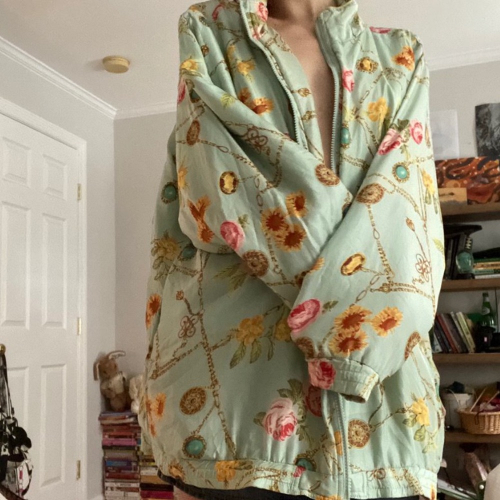 AVON light blue flower patterned bomber jacket